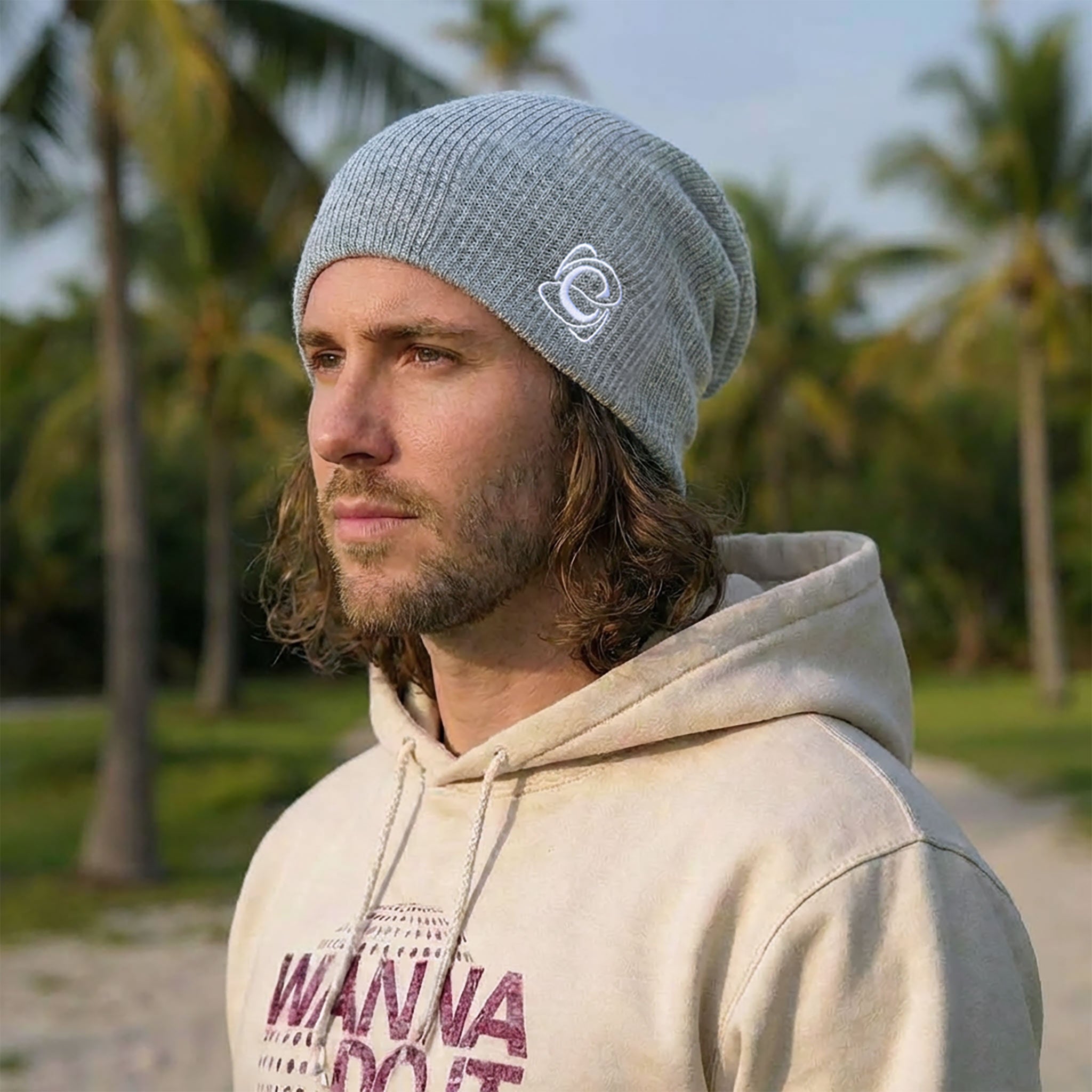 Celleste Heather Gray slouch beanie hat, with white "C" embroidered logo on the left side.