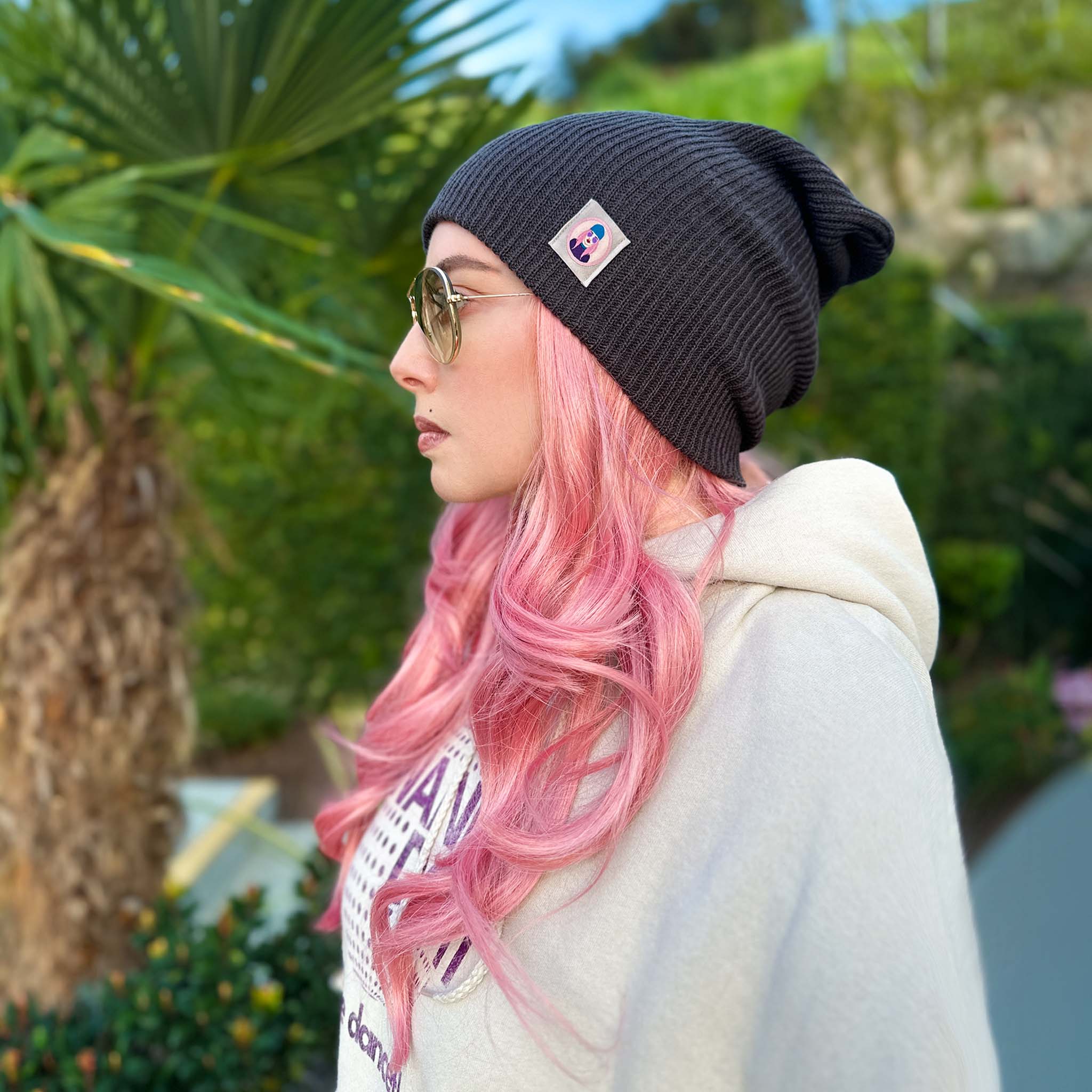 Celleste Vintage Charcoal slouch beanie hat, with Signature "Avatar Tag” on the left side.