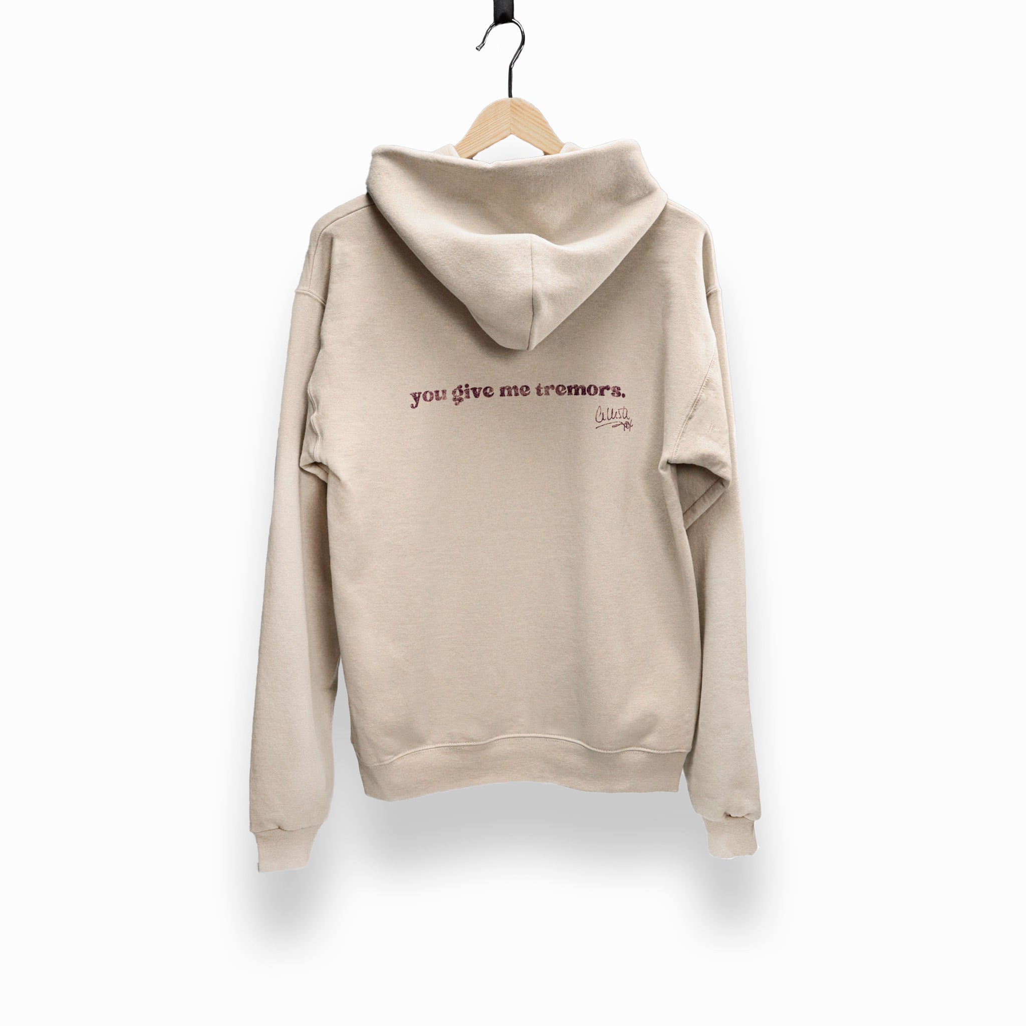 Celleste Wanna Do It Tan Hoodie with purple logo. Back view.