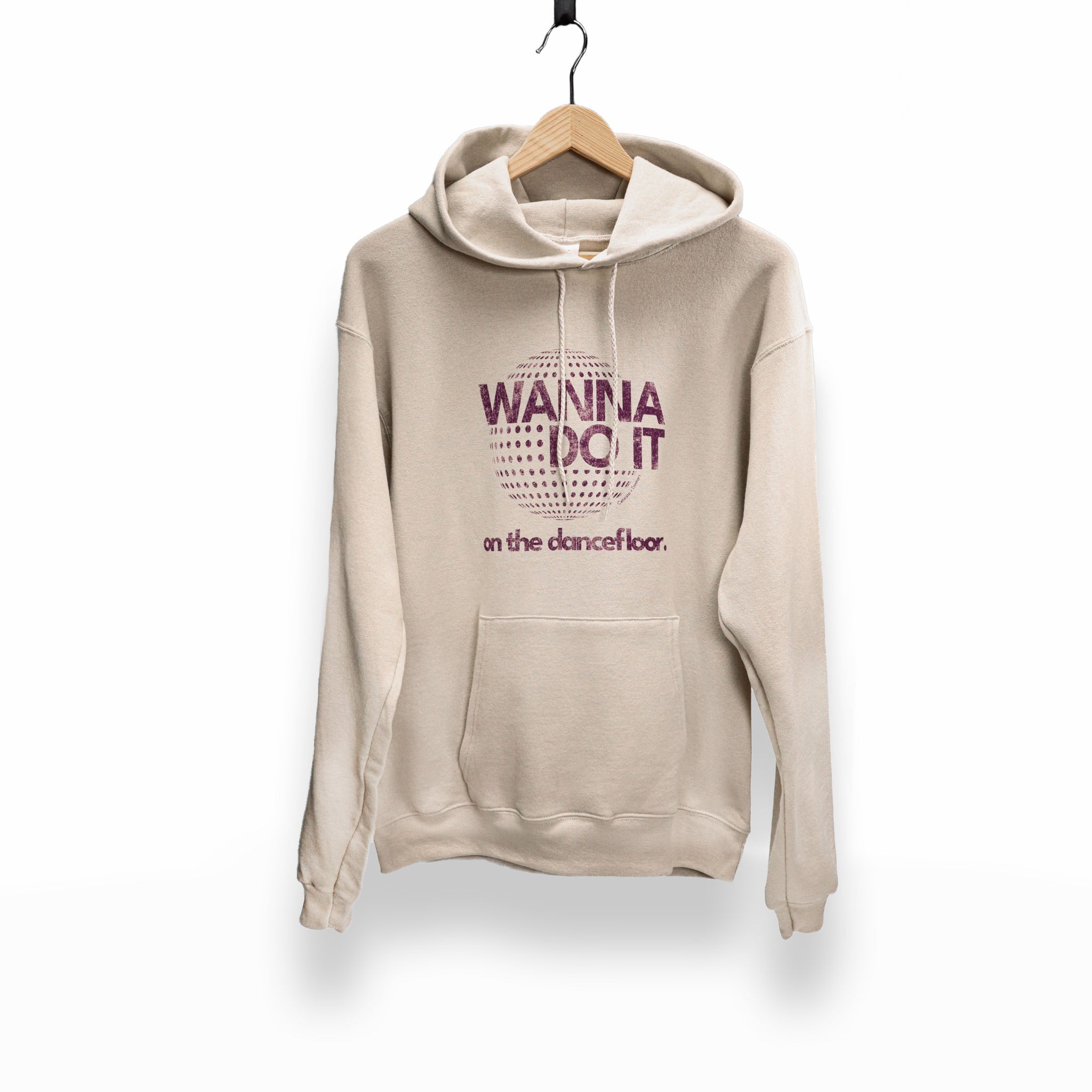 Celleste Wanna Do It Tan Hoodie with purple logo. Front view.