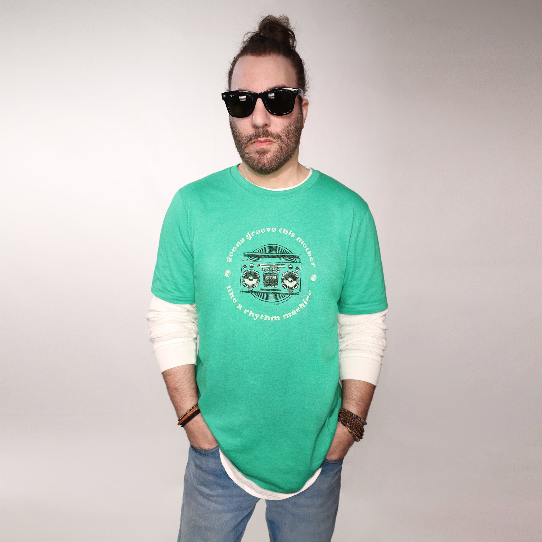 Celleste Green Groove Machine Unisex Tee. Kelly Green Color with black and white logo.