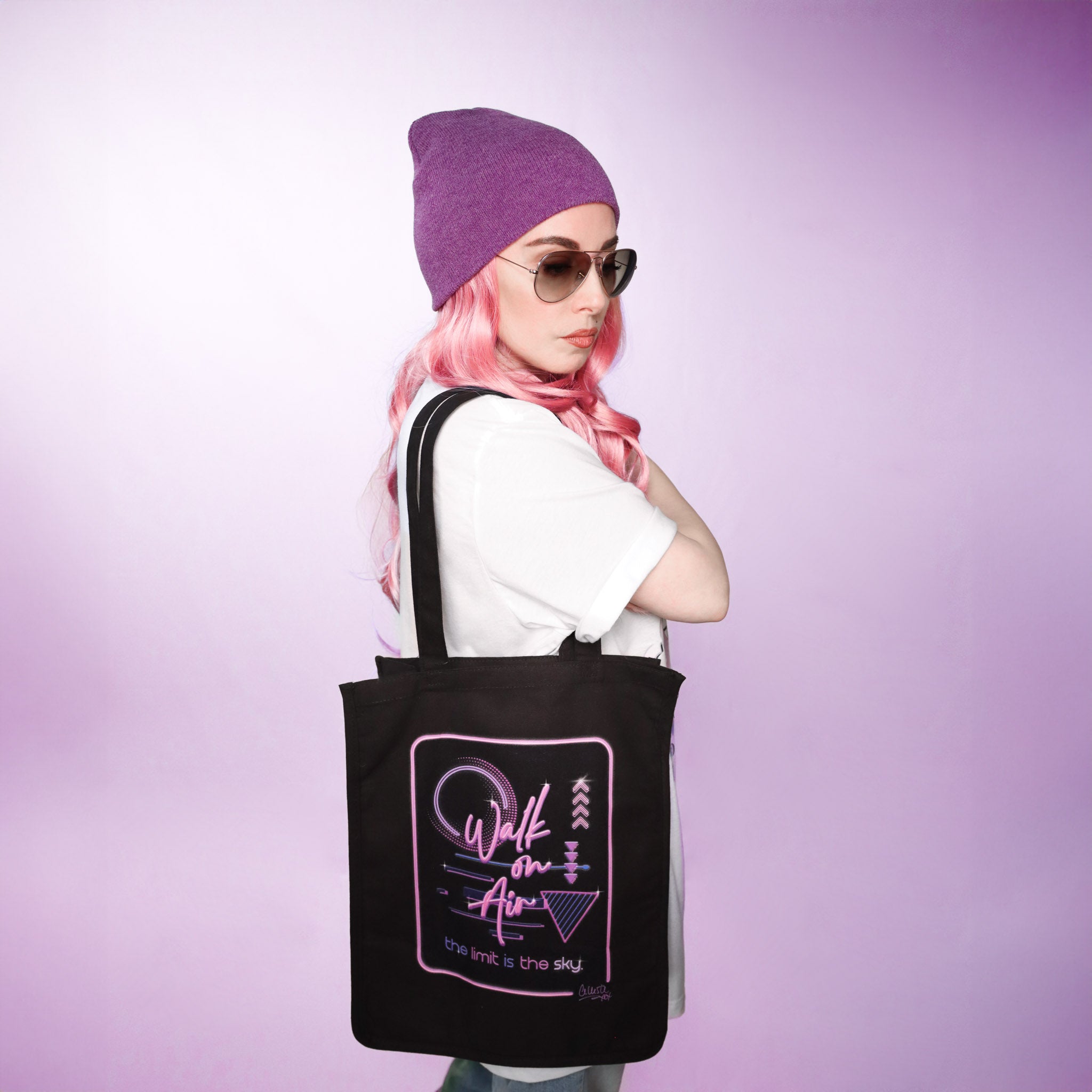 Celleste Keep on Walk on Air Tote Bag with 80's purple and pink neon logo.