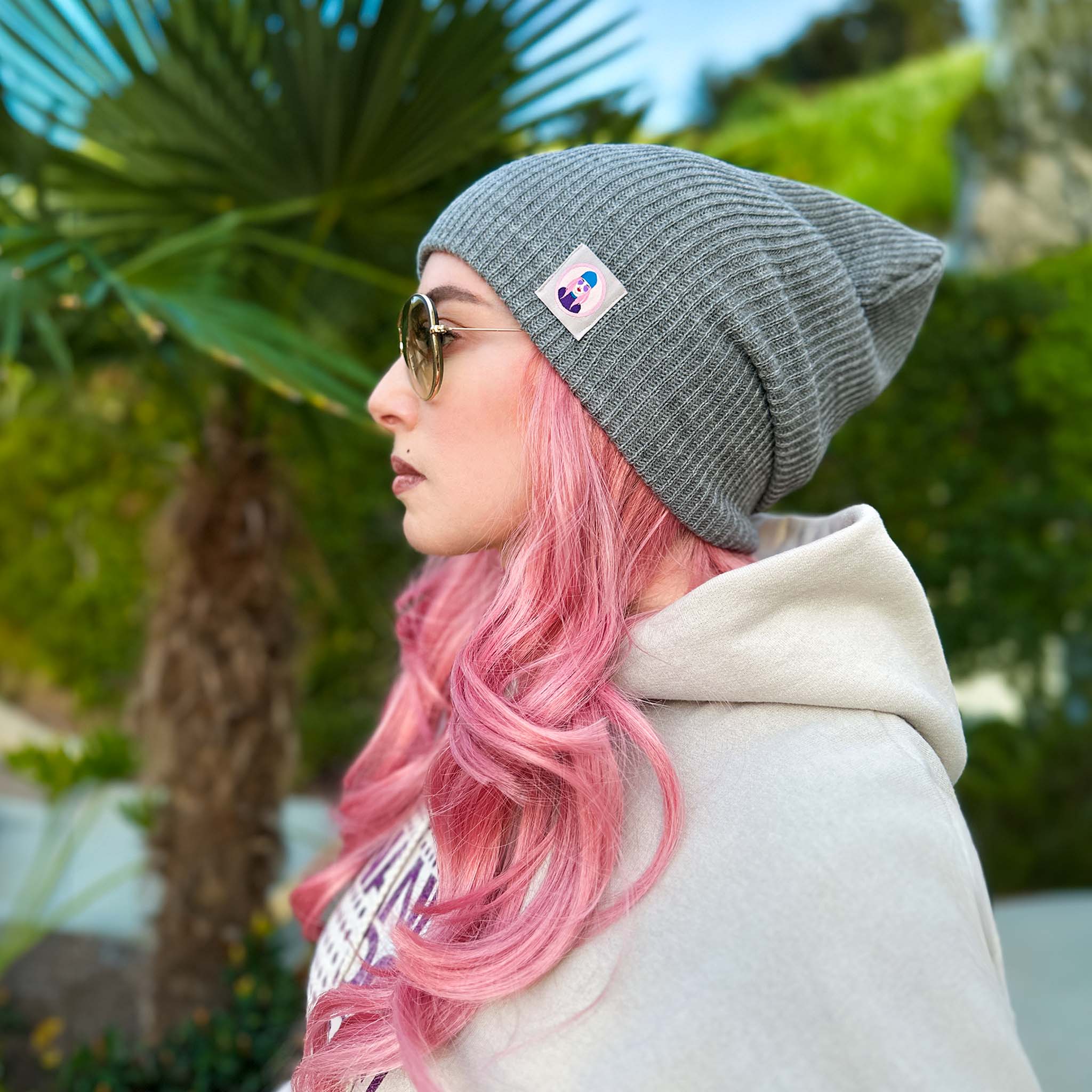 Celleste Heather Gray slouch beanie hat, with Signature "Avatar Tag” on the left side.