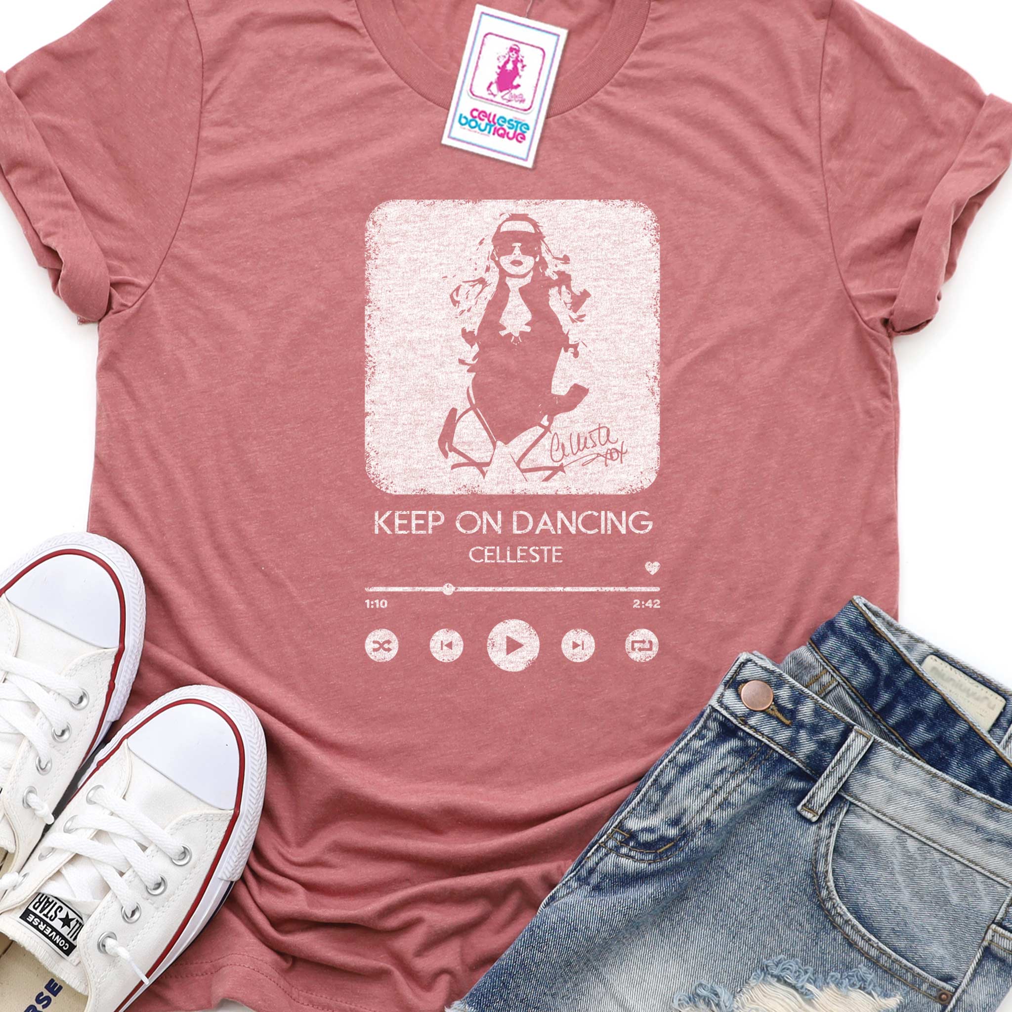 Keep on Dancing mauve T-shirt with Celleste streaming player logo in white.