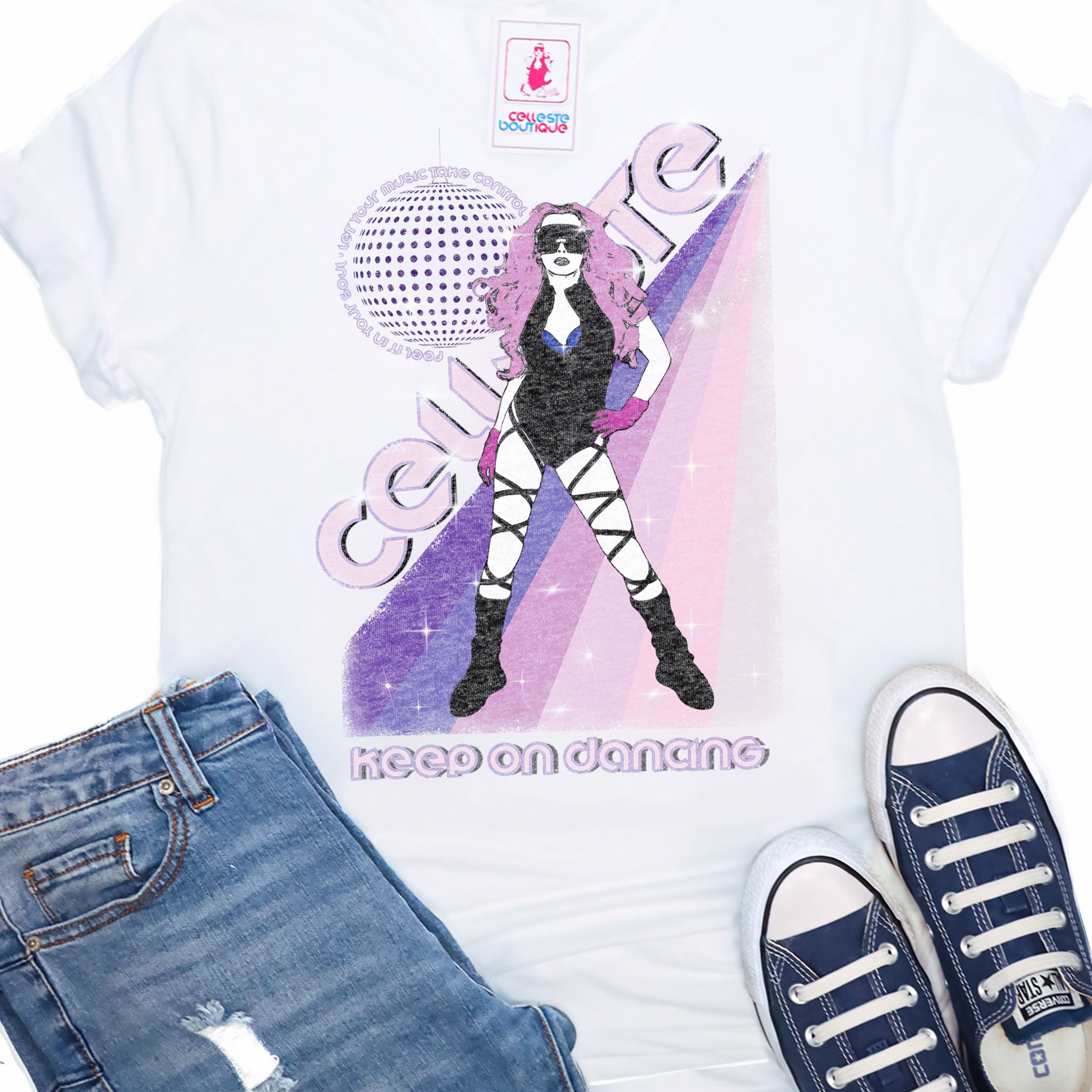 Celleste Keep On Dancing Poster Tee. White tee with rainbow and Celleste silhouette logo.